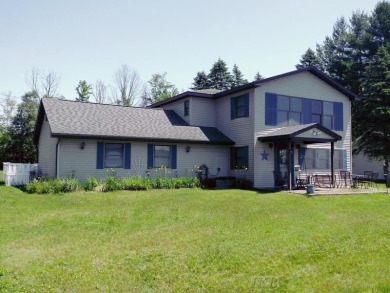 Lake Home For Sale in Harrison, Michigan