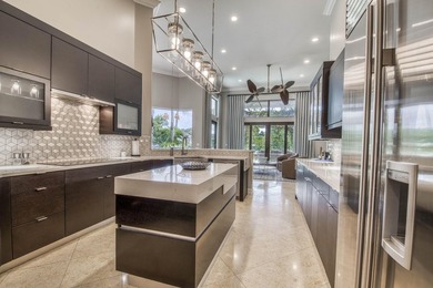 Nestled within the exclusive gated community of Islands of - photo 11