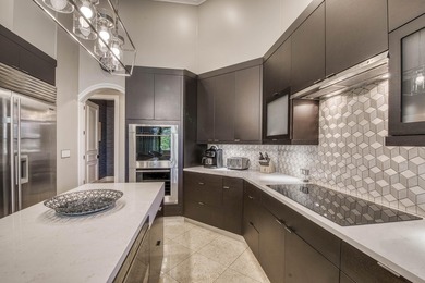Nestled within the exclusive gated community of Islands of - photo 12