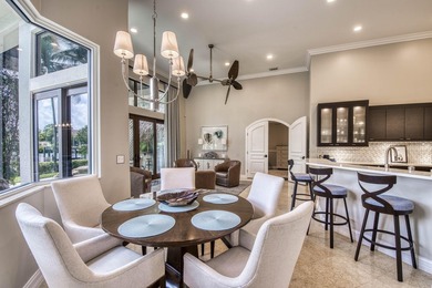 Nestled within the exclusive gated community of Islands of - photo 13