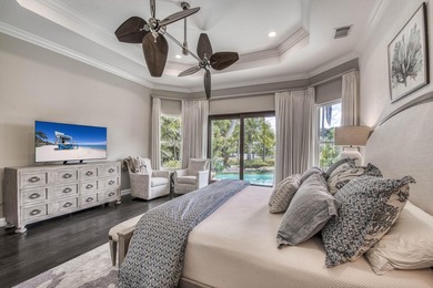 Nestled within the exclusive gated community of Islands of - photo 22