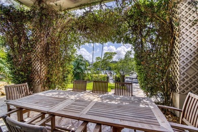 Nestled within the exclusive gated community of Islands of - photo 33