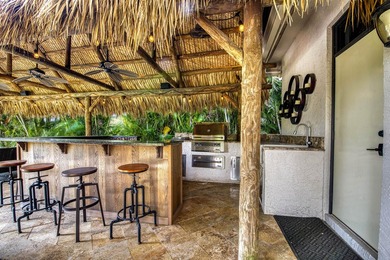 Nestled within the exclusive gated community of Islands of - photo 34
