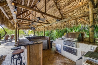 Nestled within the exclusive gated community of Islands of - photo 35