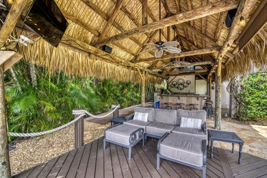 Nestled within the exclusive gated community of Islands of - photo 37