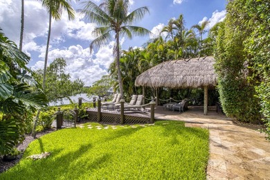 Nestled within the exclusive gated community of Islands of - photo 39