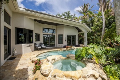 Nestled within the exclusive gated community of Islands of - photo 48