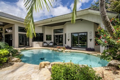 Nestled within the exclusive gated community of Islands of - photo 49