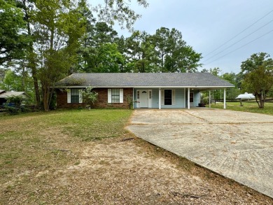 This charming brick home is nestled on 1 acre in a peaceful area - Lake Home For Sale in Zwolle, Louisiana