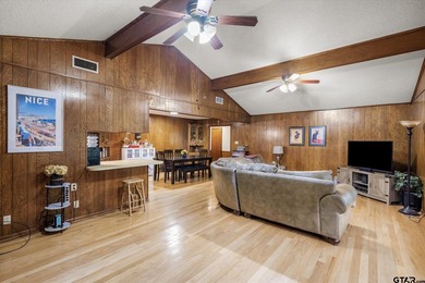 Tucked inside the gated golf and lake community of Hideaway and - photo 13