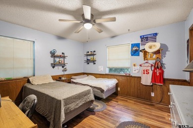 Tucked inside the gated golf and lake community of Hideaway and - photo 26