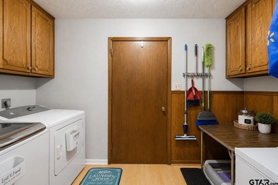 Tucked inside the gated golf and lake community of Hideaway and - photo 30