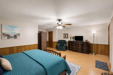 Tucked inside the gated golf and lake community of Hideaway and - photo 32