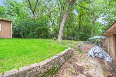 Tucked inside the gated golf and lake community of Hideaway and - photo 33