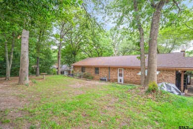 Tucked inside the gated golf and lake community of Hideaway and - photo 36