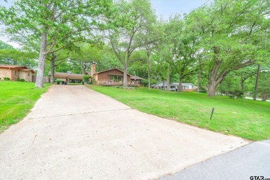 Tucked inside the gated golf and lake community of Hideaway and - photo 39