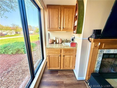Wake up to shimmering LAKE VIEWS and sunlight pouring through - photo 11