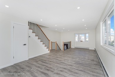 'This elegant 2 Family home features a sophisticated stocco and - photo 12