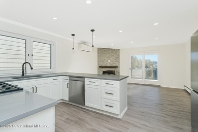 'This elegant 2 Family home features a sophisticated stocco and - photo 13
