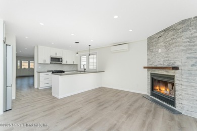 'This elegant 2 Family home features a sophisticated stocco and - photo 15