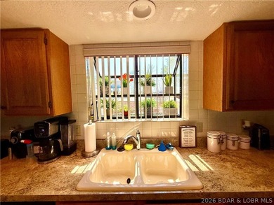 Wake up to shimmering LAKE VIEWS and sunlight pouring through - photo 17