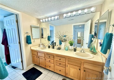 Wake up to shimmering LAKE VIEWS and sunlight pouring through - photo 21