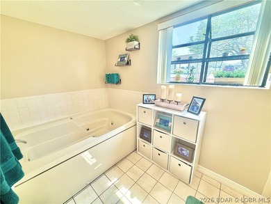 Wake up to shimmering LAKE VIEWS and sunlight pouring through - photo 22