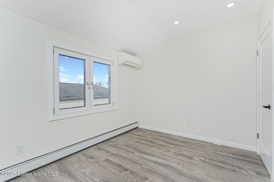 'This elegant 2 Family home features a sophisticated stocco and - photo 23