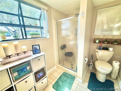 Wake up to shimmering LAKE VIEWS and sunlight pouring through - photo 24