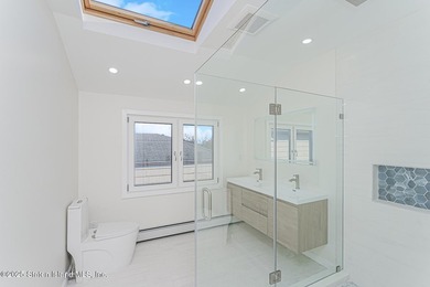 'This elegant 2 Family home features a sophisticated stocco and - photo 24