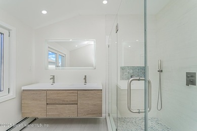 'This elegant 2 Family home features a sophisticated stocco and - photo 25