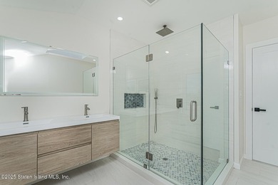 'This elegant 2 Family home features a sophisticated stocco and - photo 26