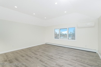 'This elegant 2 Family home features a sophisticated stocco and - photo 27