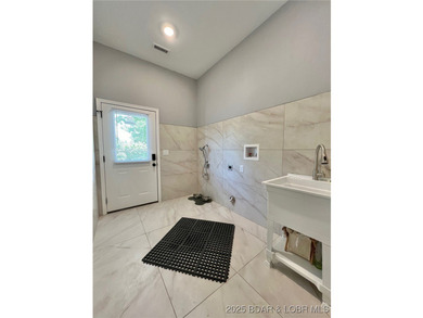 Spacious 1.20 acres and 80' of lakefront in a reg no wake cove - photo 11