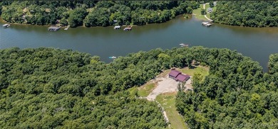 Spacious 1.20 acres and 80' of lakefront in a reg no wake cove - photo 19