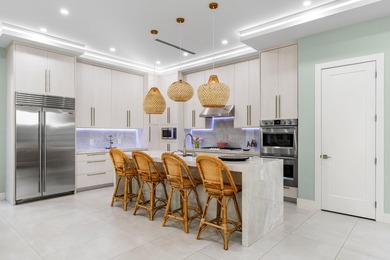 Situated on a premium lot in East Delray's La Hacienda, this - photo 9