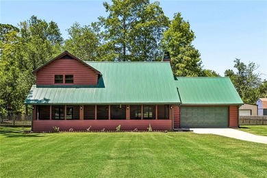 Nestled on 1.48 picturesque acres in the heart of Lacombe, this - photo 3