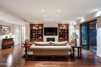 Anchored by an extraordinarily large 36-foot balcony, this