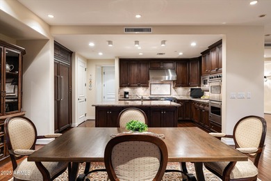 Anchored by an extraordinarily large 36-foot balcony, this