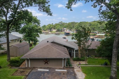 This beautiful waterfront property comes fully furnished and is - Lake Home For Sale in Mabank, Texas
