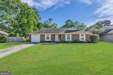 Welcome home to this charming 3-bedroom, 2-bath home in the - photo 1