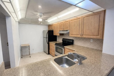 Nestled in east Boca Raton, Boca Bayou is a hidden gem condo - photo 4
