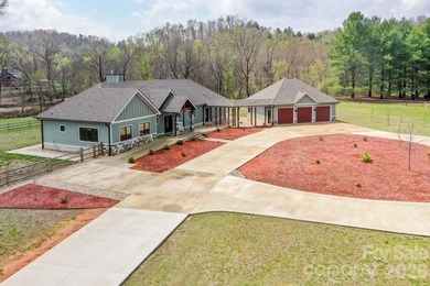 STUNNING RIVERFRONT ESTATE IN LAKE LURE NC. Situated on 8.5 - photo 3