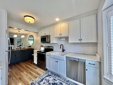Enjoy serene pond views from this sunny and beautifully updated - photo 4