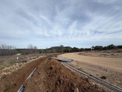 Streets are gravel right now but slated to be finished with - photo 2