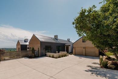 Architecturally stunning and built for entertaining, this rare - photo 1