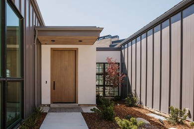 Architecturally stunning and built for entertaining, this rare - photo 3
