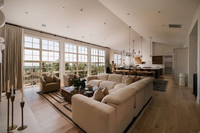 Architecturally stunning and built for entertaining, this rare - photo 4
