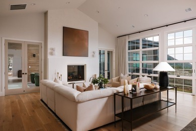 Architecturally stunning and built for entertaining, this rare - photo 5
