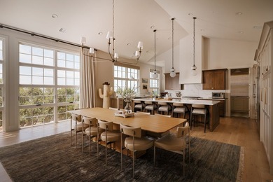 Architecturally stunning and built for entertaining, this rare - photo 8
